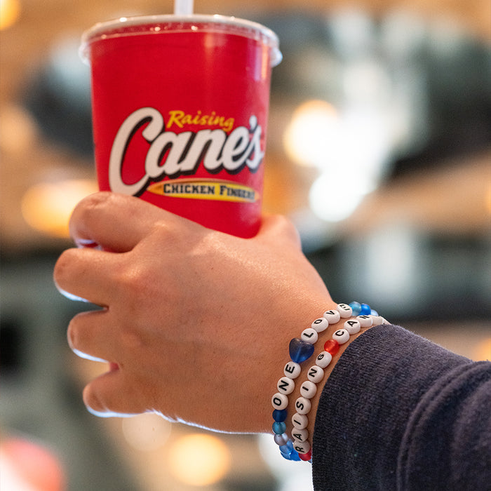 Raising Cane's and One Love bracelets