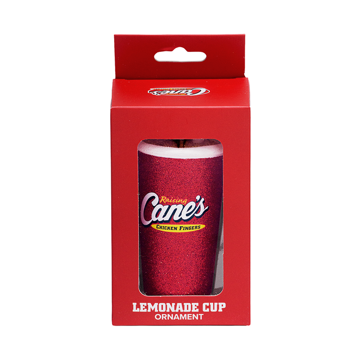 Lemonade cup ornament in red packaging a white background