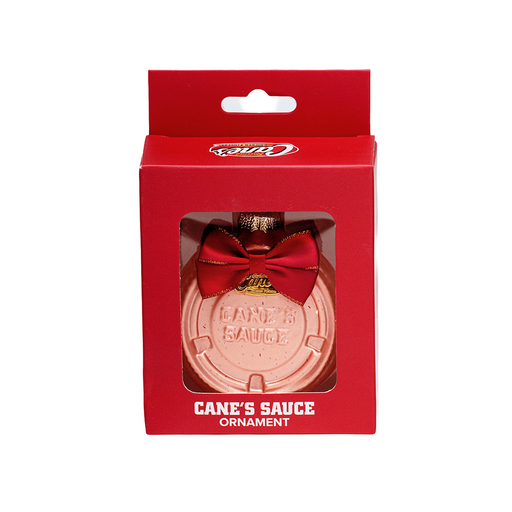 Cane's Sauce ornament in red box packaging on a white background