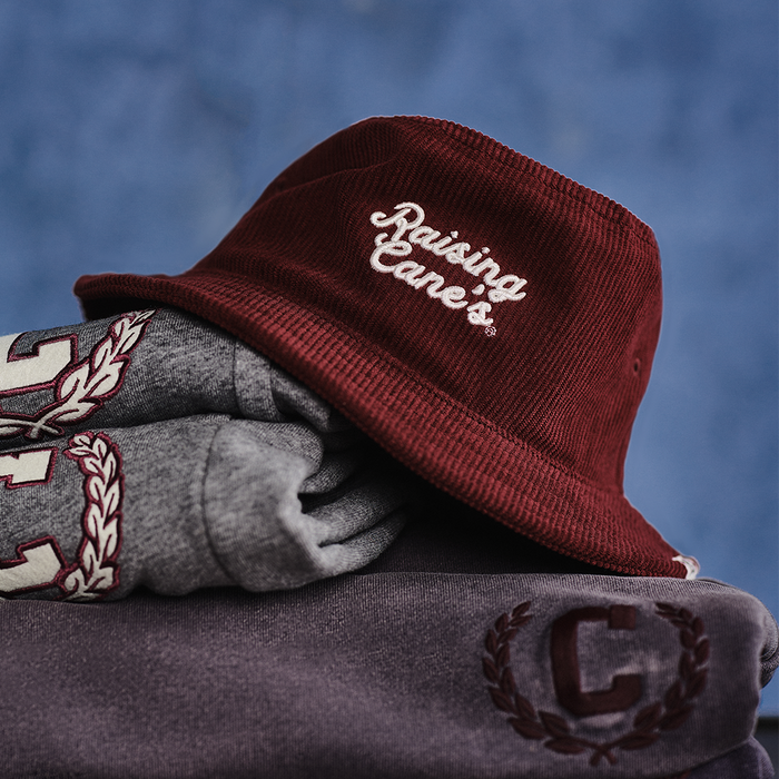 Raising Cane's Corduroy Bucket Hat against blue background
