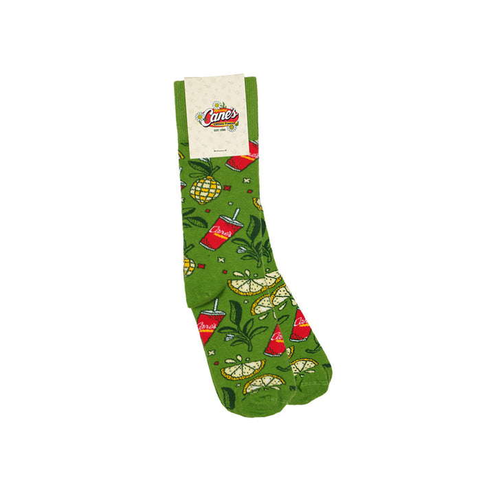 Green socks with fruit pattern on a white background