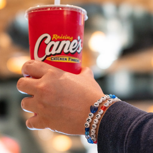 Raising Cane's and One Love bracelets