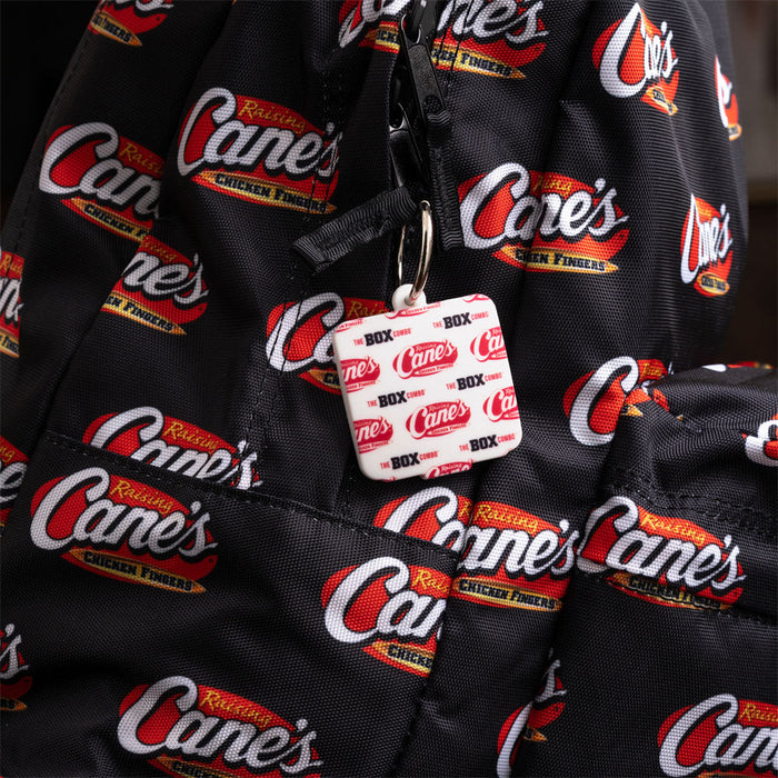 Box Combo Key Tag Holder on black Raising Cane's backpack
