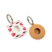 Two keychains, one white with red text and the other brown, on a white background.