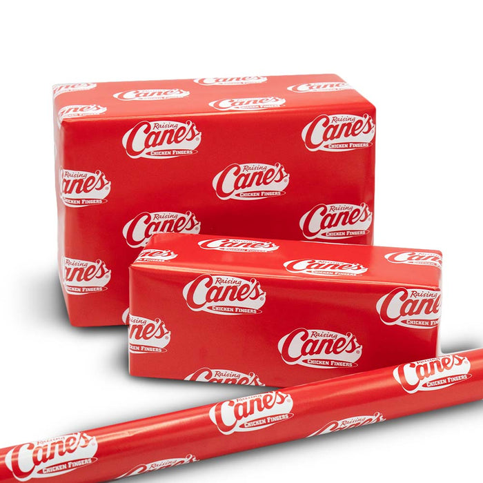 red wrapping paper with Raising Cane's logo design