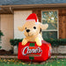 Holiday Lawn Inflatable with Dog in Santa Hat with House Background