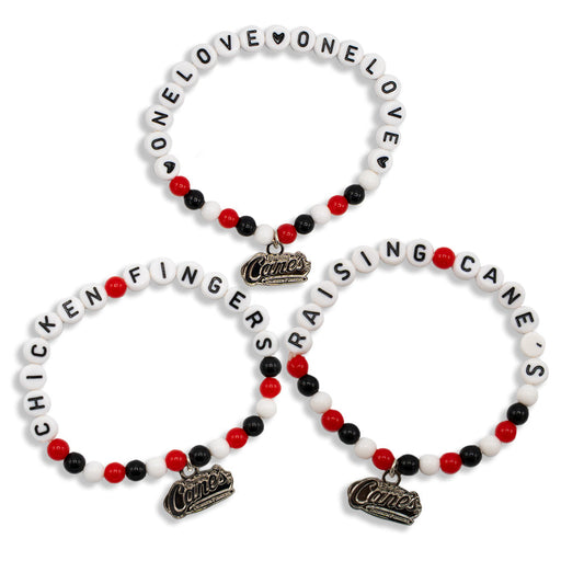 Three red, white and black Raising Cane's beaded bracelets