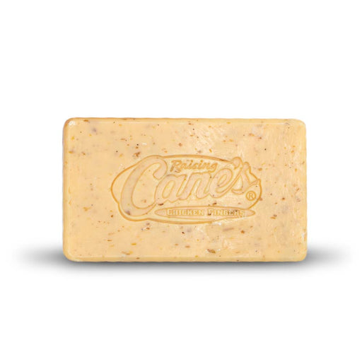 Tan colored soap with Raising Cane's logo stamped on top